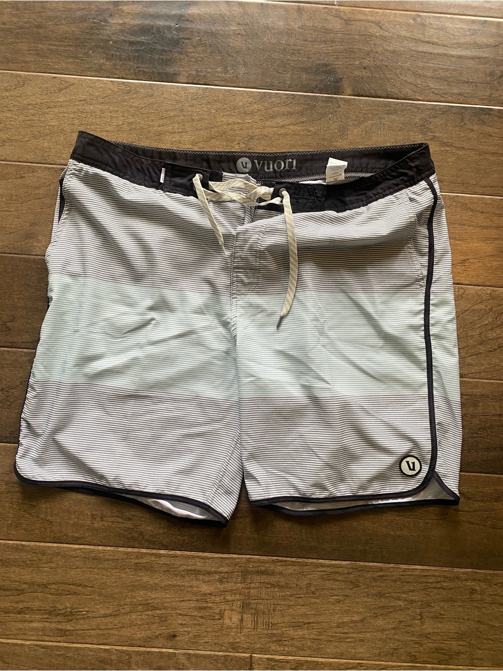 Vuori Men’s Black, Light Gray and Green Striped Swim Shorts